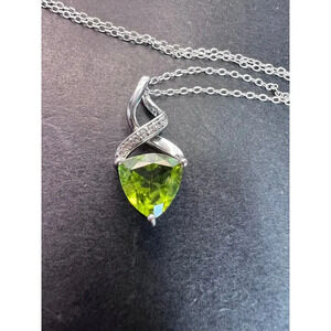 Trilliant cut peridot and sterling silver pendant and 18 inch chain